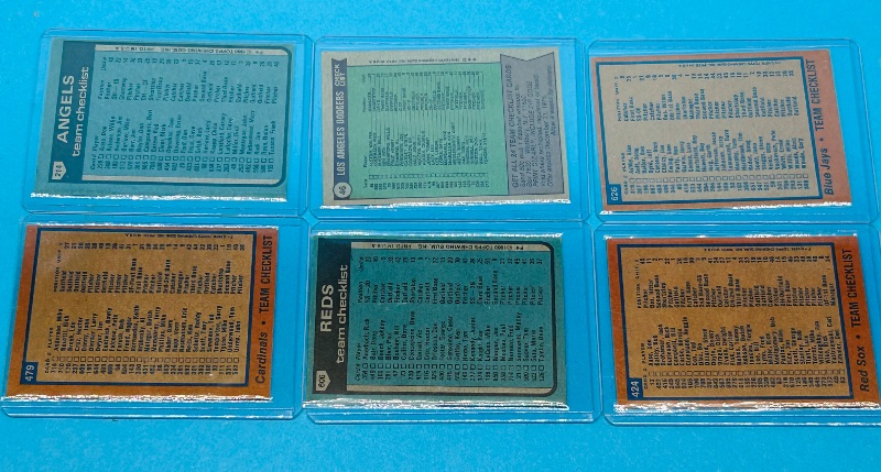Photo 1 of 025286…6 vintage team checklist cards from the 1970’s in hard plastic sleeves 