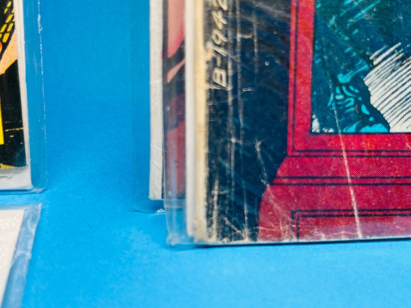 Photo 1 of 025311…damaged bent corners, wear vintage comics in plastic sleeves