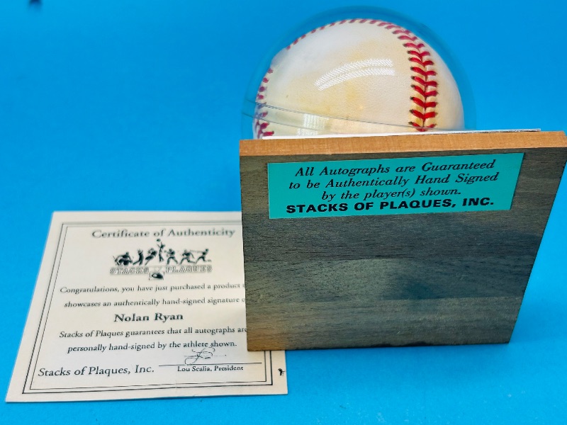 Photo 1 of 025326…autographed Nolan Ryan baseball with COA in display 