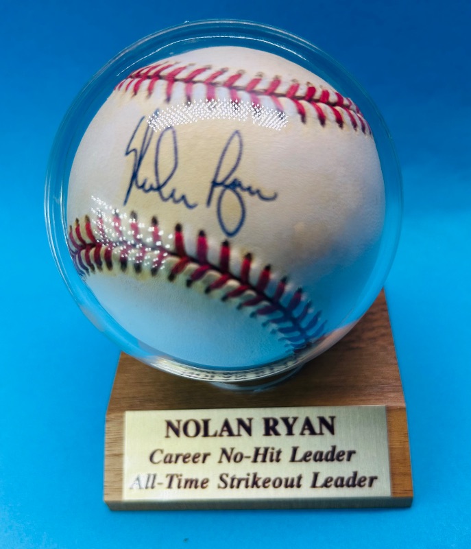 Photo 1 of 025326…autographed Nolan Ryan baseball with COA in display 