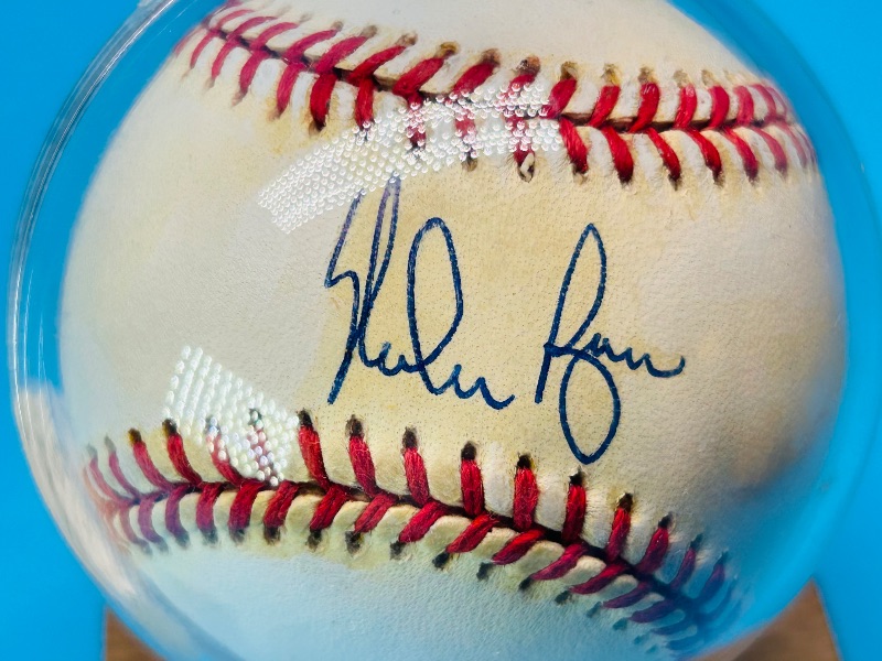 Photo 1 of 025326…autographed Nolan Ryan baseball with COA in display 