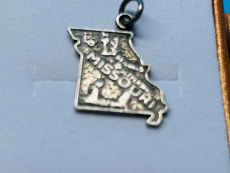 Photo 1 of 025496… vintage sterling silver charm in gift box - some wear from age