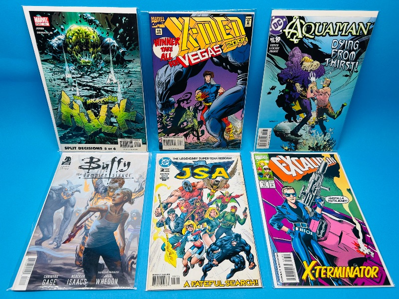Photo 1 of 025546…6  comics in plastic sleeves 