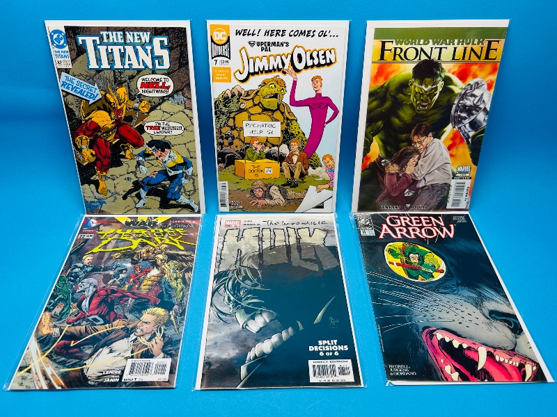 Photo 1 of 025550…6  comics in plastic sleeves 
