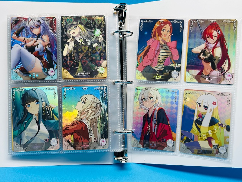 Photo 1 of 025574… final sale no return/refund-80 misc holo asian Anime cards in binder