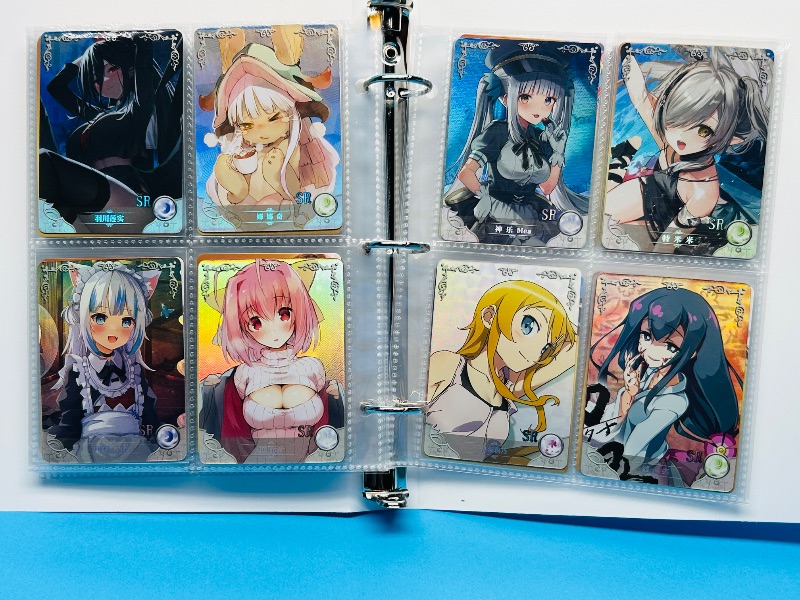 Photo 1 of 025574… final sale no return/refund-80 misc holo asian Anime cards in binder