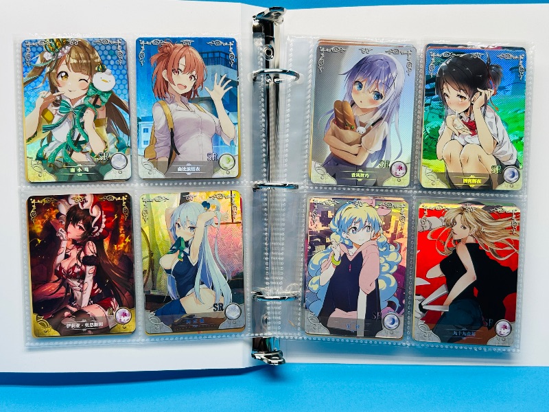 Photo 1 of 025574… final sale no return/refund-80 misc holo asian Anime cards in binder