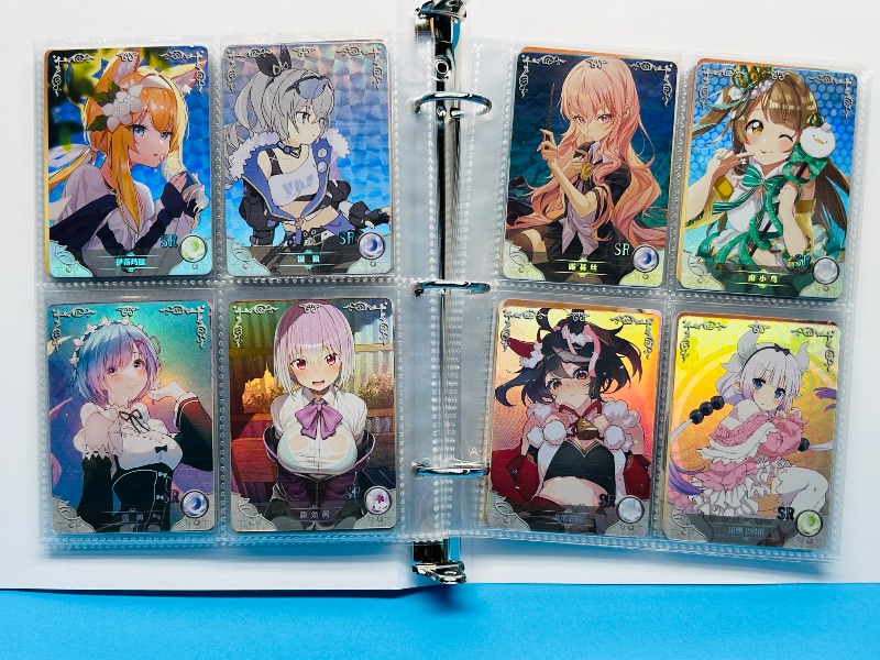 Photo 1 of 025574… final sale no return/refund-80 misc holo asian Anime cards in binder