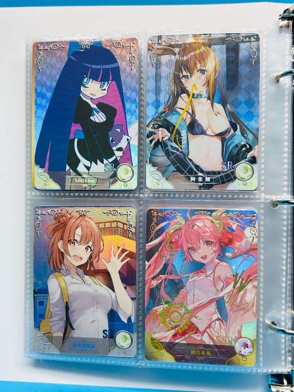 Photo 1 of 025574… final sale no return/refund-80 misc holo asian Anime cards in binder
