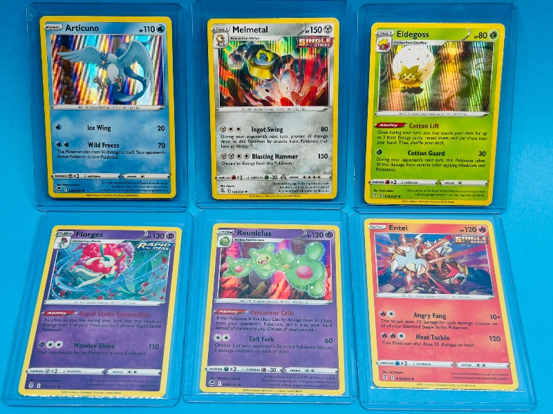 Photo 1 of 025602… 6  holo  Pokémon cards in hard plastic sleeves 