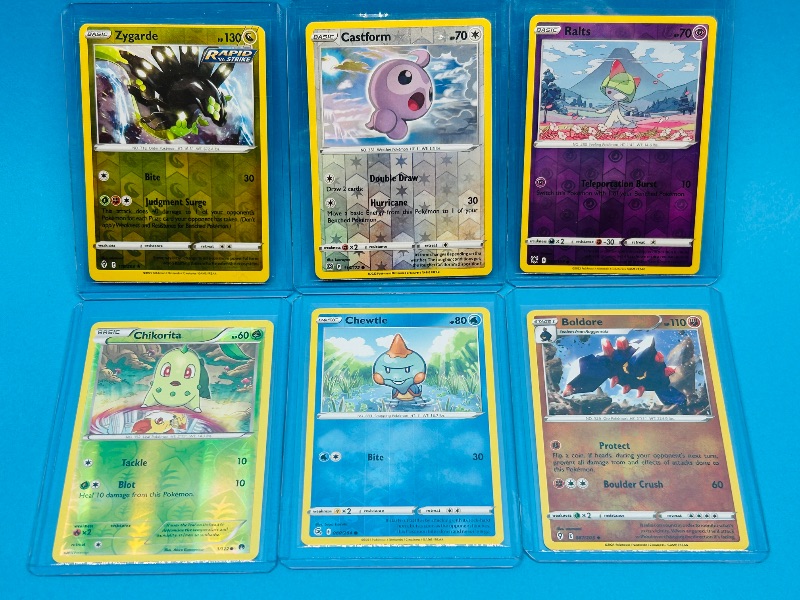 Photo 1 of 025603… 6 reverse holo  Pokémon cards in hard plastic sleeves 