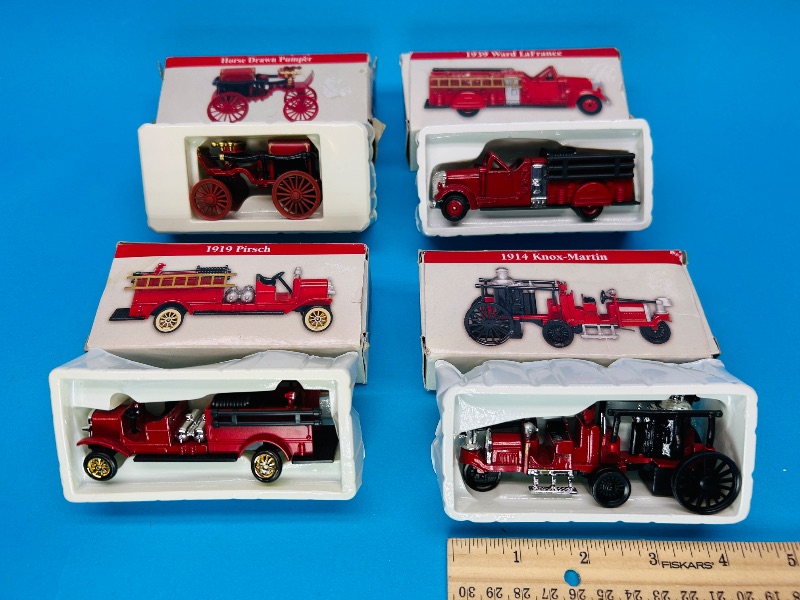 Photo 1 of 025619…4 collectible mini fire trucks 