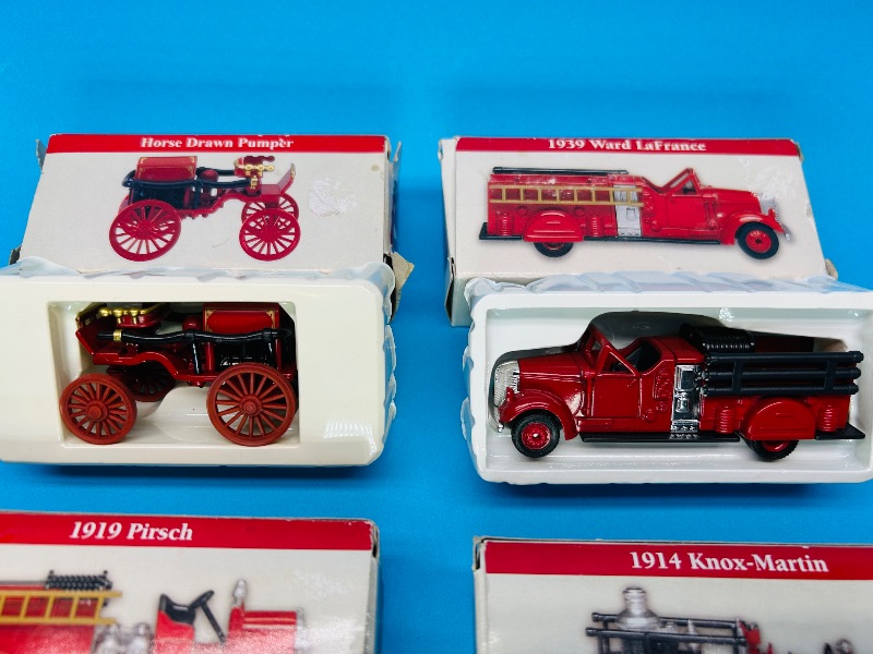 Photo 1 of 025619…4 collectible mini fire trucks 