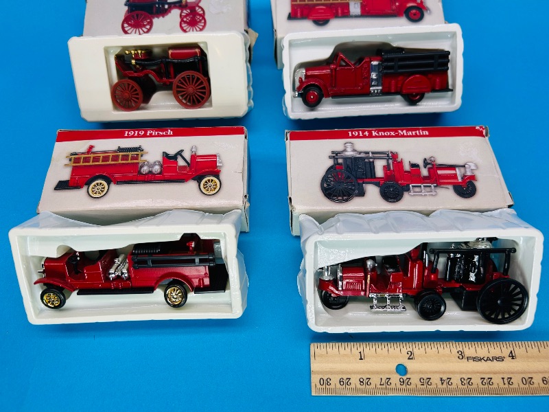 Photo 1 of 025619…4 collectible mini fire trucks 