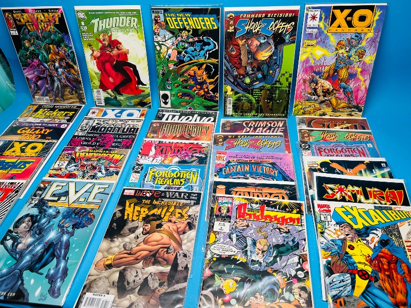 Photo 1 of 025702… final sale no return/refund- 30 misc comics in plastic sleeves