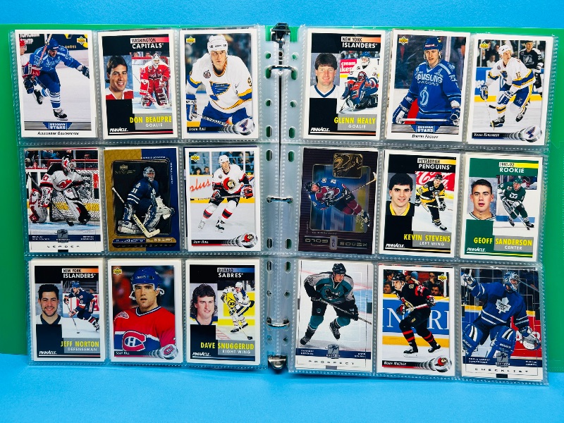 Photo 1 of 025719…  final sale no return/refund -270 mixed Hockey  cards in binder