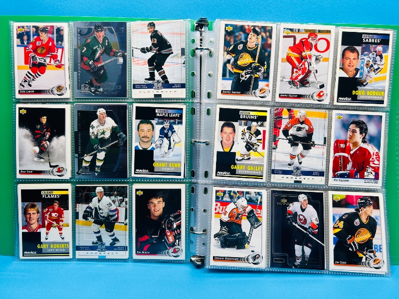 Photo 1 of 025719…  final sale no return/refund -270 mixed Hockey  cards in binder