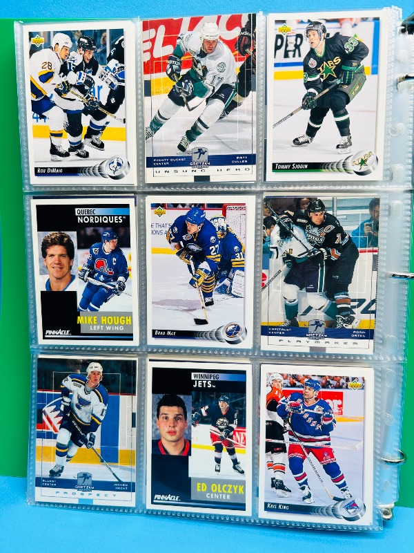 Photo 1 of 025719…  final sale no return/refund -270 mixed Hockey  cards in binder