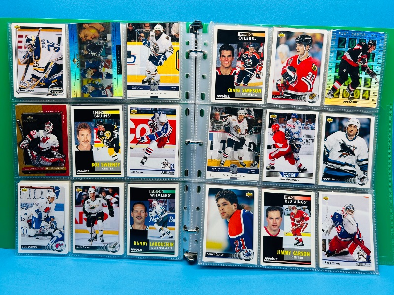 Photo 1 of 025719…  final sale no return/refund -270 mixed Hockey  cards in binder