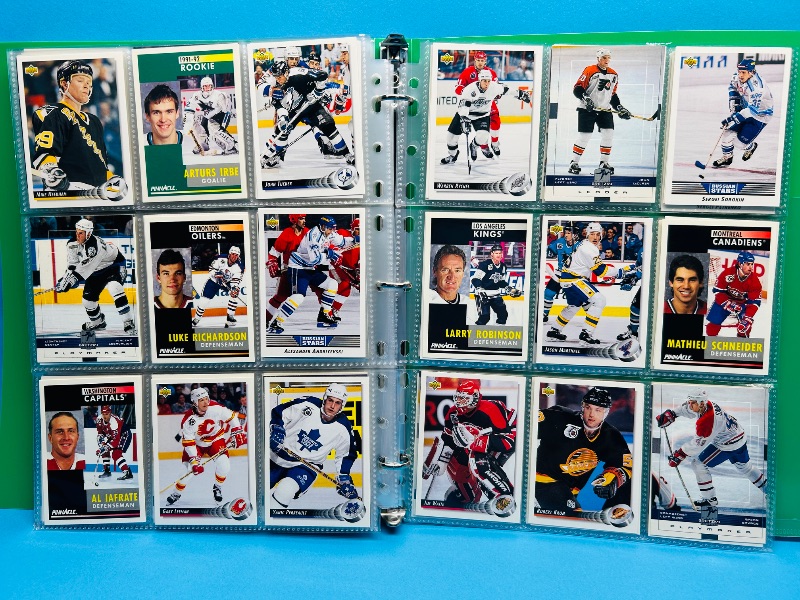 Photo 1 of 025719…  final sale no return/refund -270 mixed Hockey  cards in binder