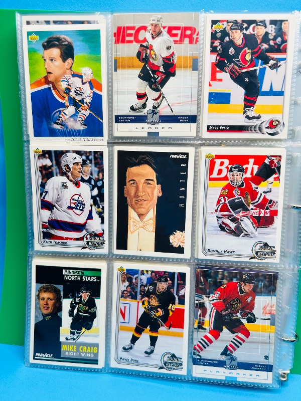 Photo 1 of 025720… final sale no return/refund -270 mixed hockey cards in binder