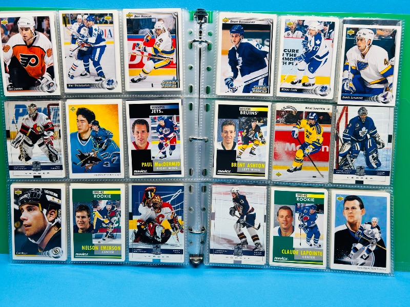 Photo 1 of 025720… final sale no return/refund -270 mixed hockey cards in binder