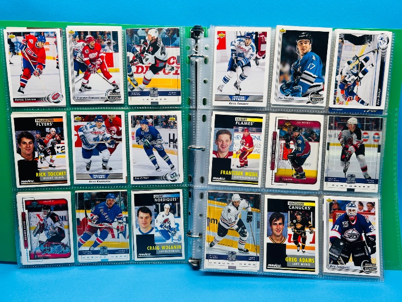 Photo 1 of 025720… final sale no return/refund -270 mixed hockey cards in binder