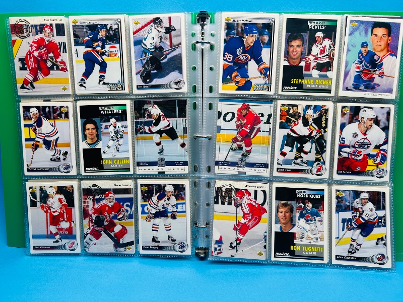 Photo 1 of 025720… final sale no return/refund -270 mixed hockey cards in binder