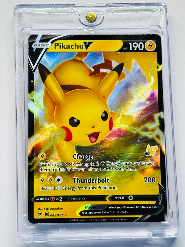 Photo 1 of 025759…Pikachu V holo Pokémon card in hard plastic case