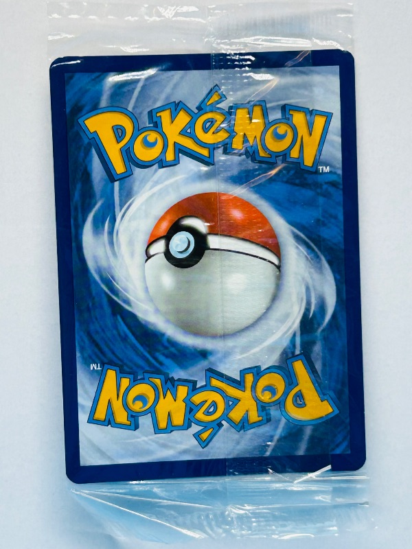 Photo 1 of 025763…sealed-Vanilluxe Holo Pokémon card in hard plastic sleeve