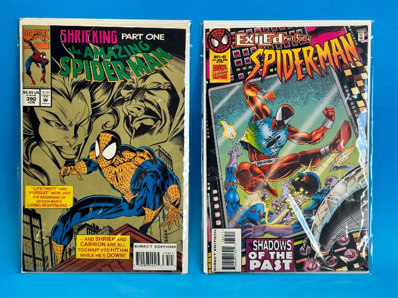 Photo 1 of 025874… 2 Spider-Man comics in plastic sleeves 