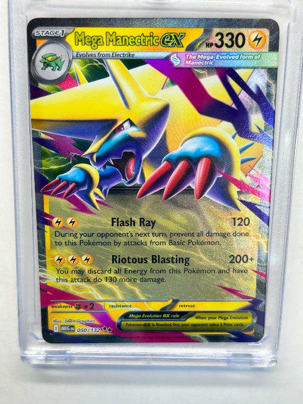 View 1 of 025912…Mega Manectric EX foil Pokémon card in hard plastic case
