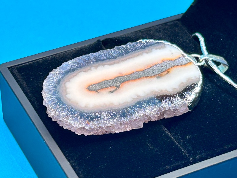 View 2 of 026012… amethyst stalactite slice pendant on 16” chain in lighted gift box