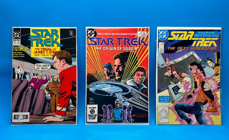 View 1 of 026028… 3 vintage Star Trek comics in plastic sleeves 