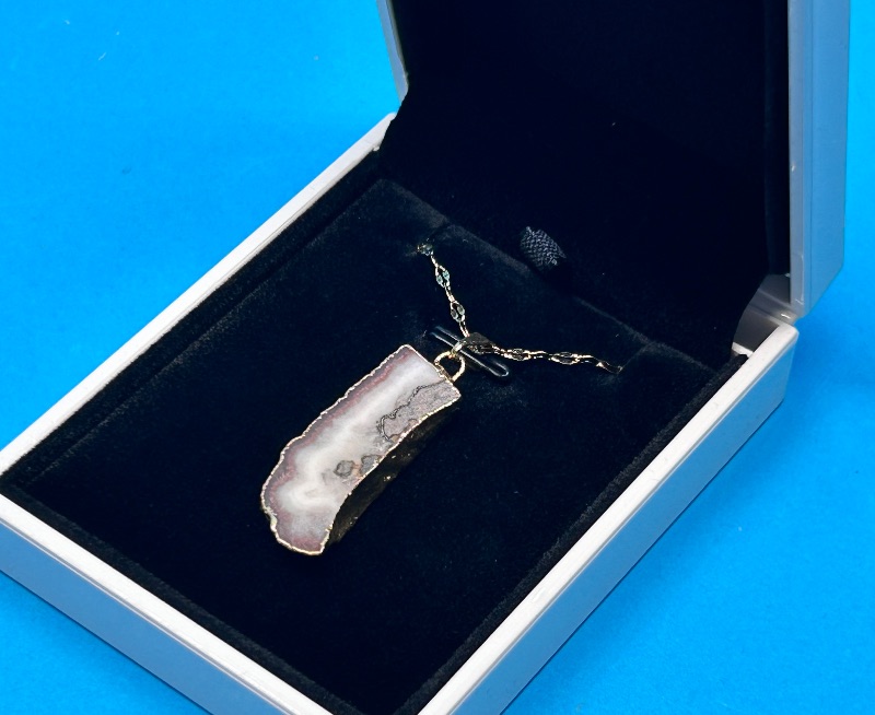 Photo 1 of 026052… amethyst stalactite on adjustable 18-20” chain in lighted gift box