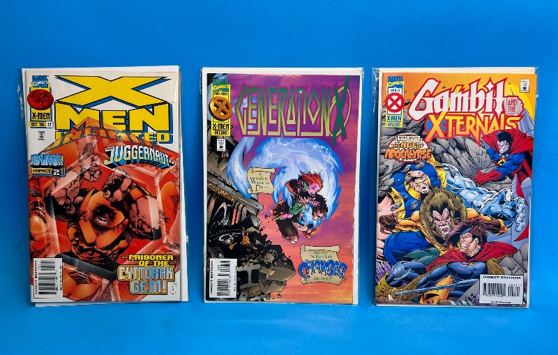 Photo 1 of 026088…3  comics in plastic sleeves 