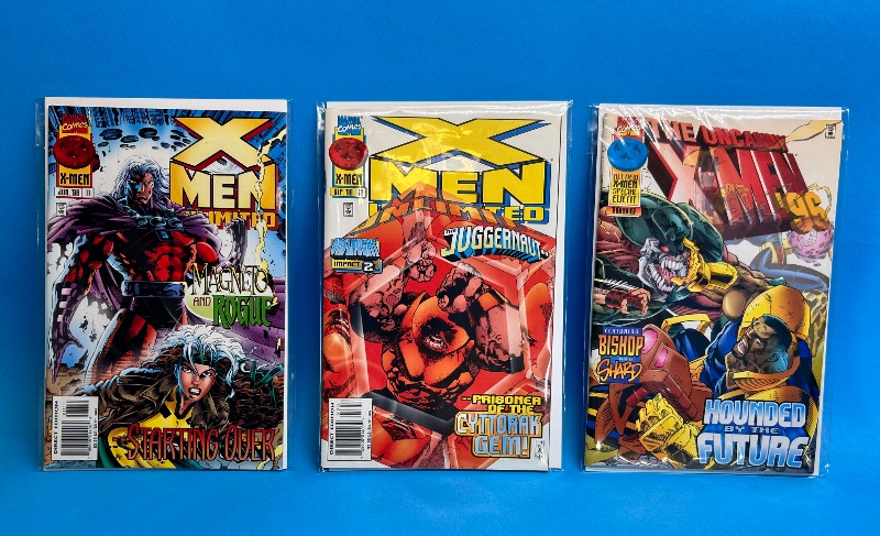 Photo 1 of 026091…3 X-men comics in plastic sleeves