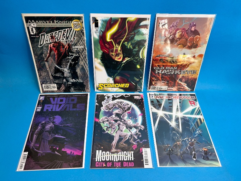 Photo 1 of 026099…6  comics in plastic sleeves 