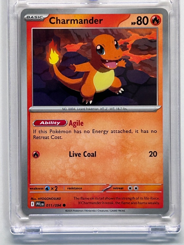 Photo 1 of 026108… Charmander  Pokémon card in hard plastic case
