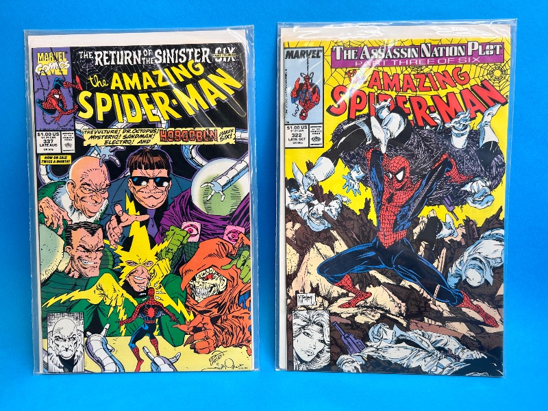 Photo 1 of 026110…2 vintage Spider-Man comics in plastic sleeves