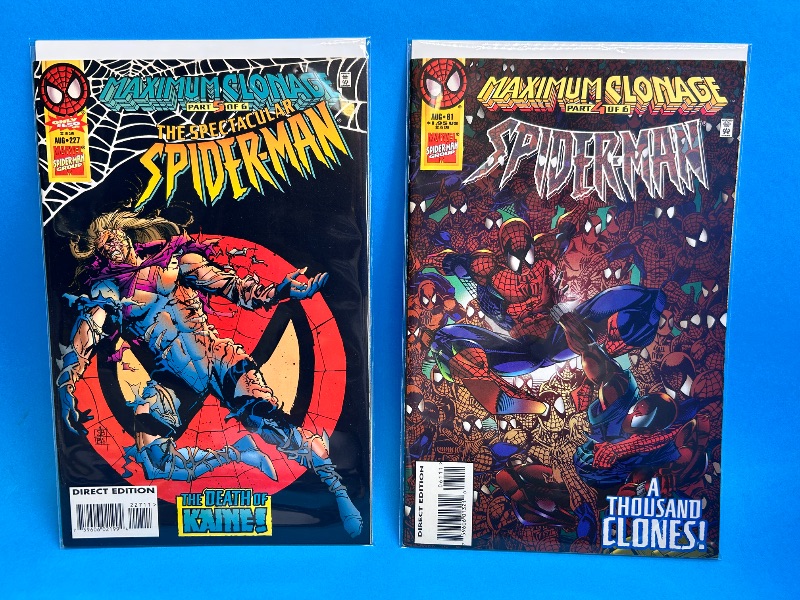 Photo 1 of 026114… 2 Spider-Man comics in plastic sleeves
