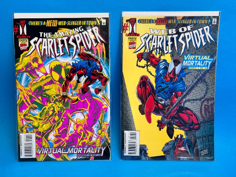 Photo 1 of 026115… 2 Spider-Man comics in plastic sleeves 