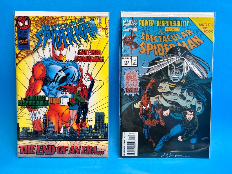 Photo 1 of 026116… 2 Spider-Man comics in plastic sleeves 