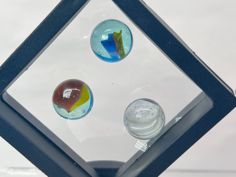 Photo 1 of 026150…vintage cat eye marbles in displays