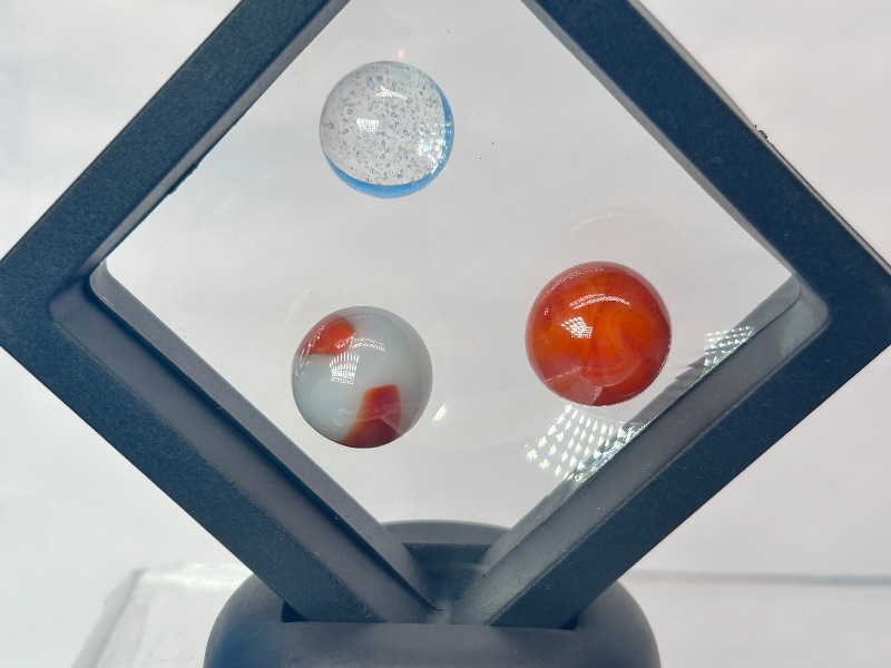 Photo 1 of 026151…vintage cat eye marbles in displays 