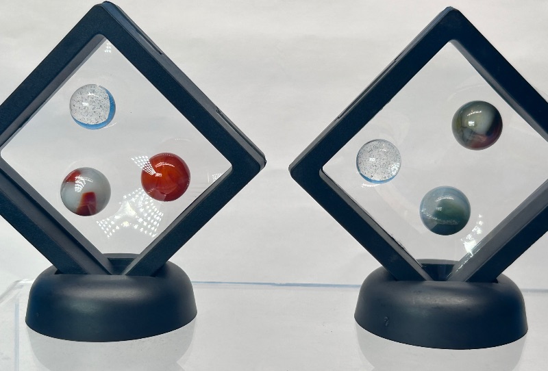 Photo 1 of 026151…vintage cat eye marbles in displays 