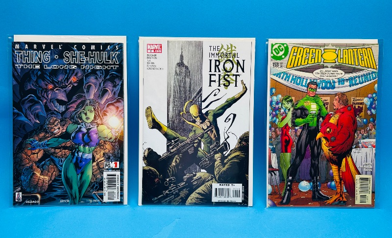 Photo 1 of 026171…3 comics in plastic sleeves 