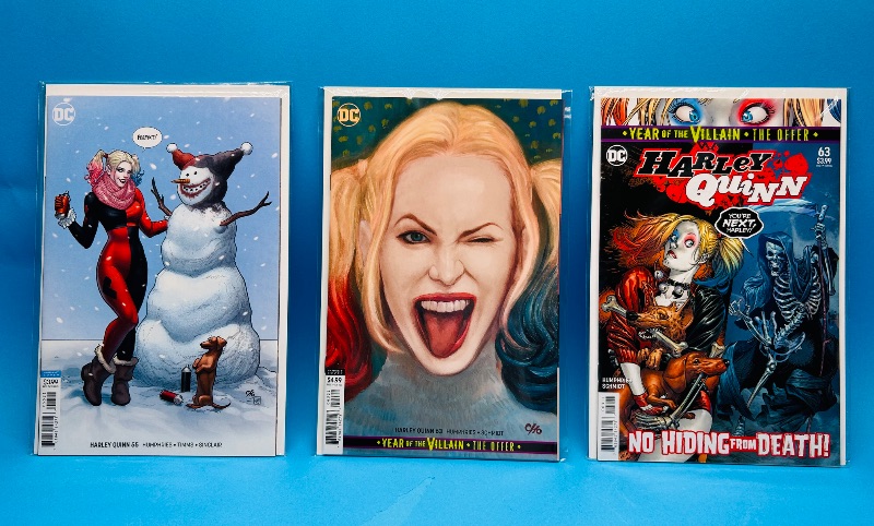 Photo 1 of 026210…3 Harley Quinn comics in plastic sleeves 