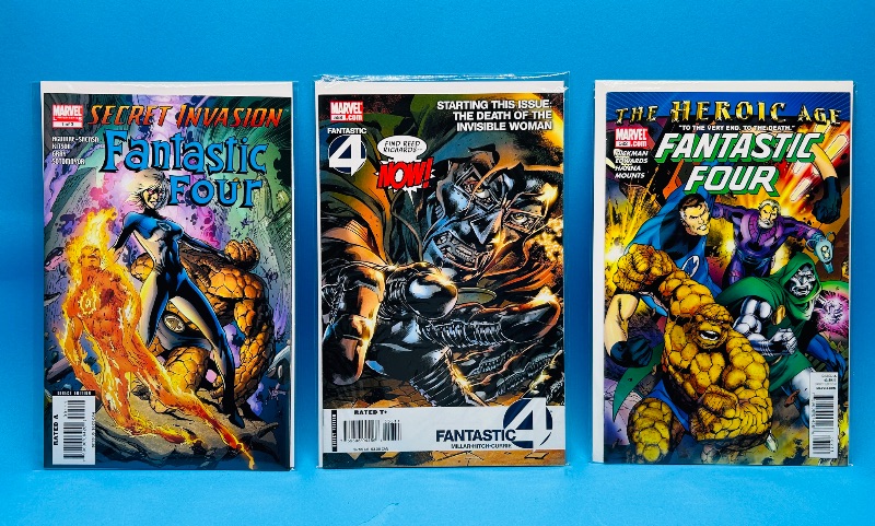 Photo 1 of 026211…3 fantastic four comics in plastic sleeves 