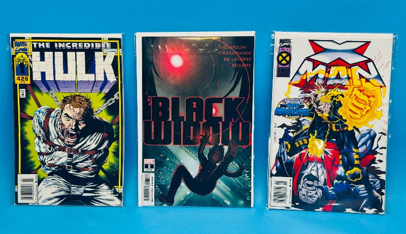 Photo 1 of 026265…3 comics in plastic sleeves 